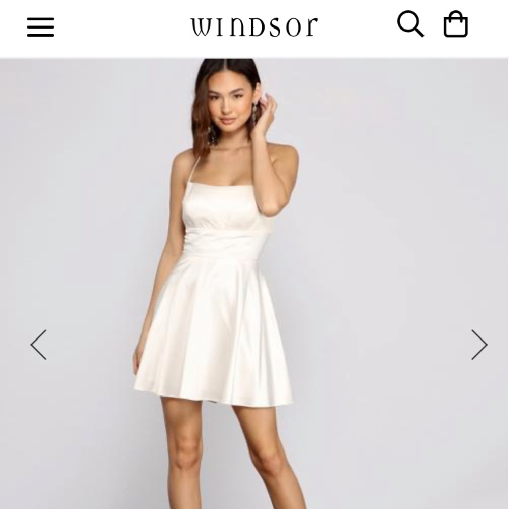 Ivory open back satin skater dress
